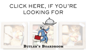 An advertisement for Butler's Boardroom featuring boxed lunches with sandwiches and fruit. The text reads "Click here if you're looking for" above a cartoon butler holding a tray and briefcase.